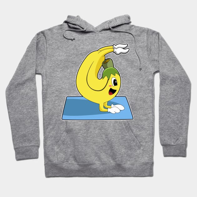 Banana at Yoga on Yoga mat Hoodie by Markus Schnabel